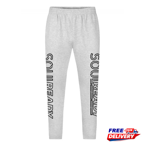 Light grey jog pants with bold black side lettering, elastic waistband, free UK delivery badge